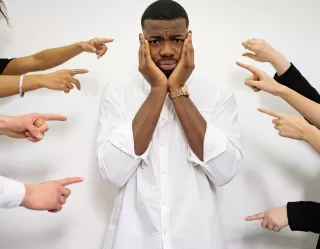 A man showing vulnerability in a conversation, feeling rejected by his partner's response