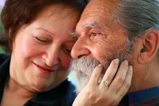 Couple communicating amidst tension, reflecting on why their marriage feels like a constant struggle