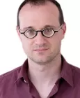 Individual contemplating emotions while questioning their partner's feelings in a relationship