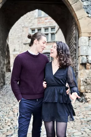 Individual pondering feelings of insecurity regarding a partner's affection and relationship signals