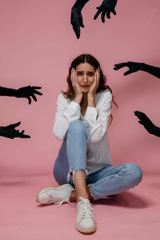 Individual contemplating emotional barriers that lead to sabotaging relationships out of fear