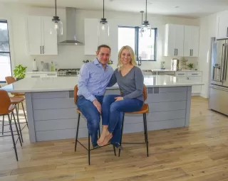 Partner showing signs of stress and overwhelm in a cozy home environment