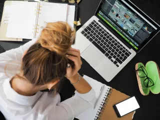 Person pondering self-care while feeling guilt about personal pleasure needs