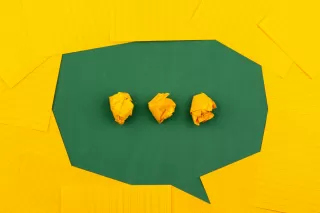 Couple engaged in a conversation, one partner seems dismissive of the other's input