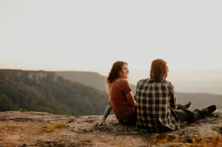 Two friends sharing a moment, revealing hidden romantic feelings through body language.