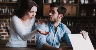 Person feeling neglected while partner watches porn, highlighting relationship signals of emotional distance.