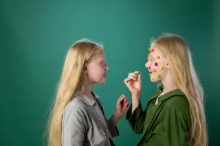Twins sharing an emotional moment, reflecting on their unique bond and communication