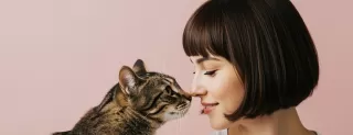 Person reflecting on emotional behavior and meaning connected to what are the signs that my pet can sense