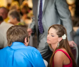 A person reading body language cues while contemplating signs of interest and distance in relationships