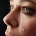 Couple communicating about grief, revealing differing responses to losing a baby