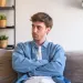 Person reflecting on uncertainty in a relationship connected to partner always seem to play the victim in arguments