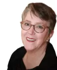 A family gathering with moments of laughter during attempts to reconnect emotionally.
