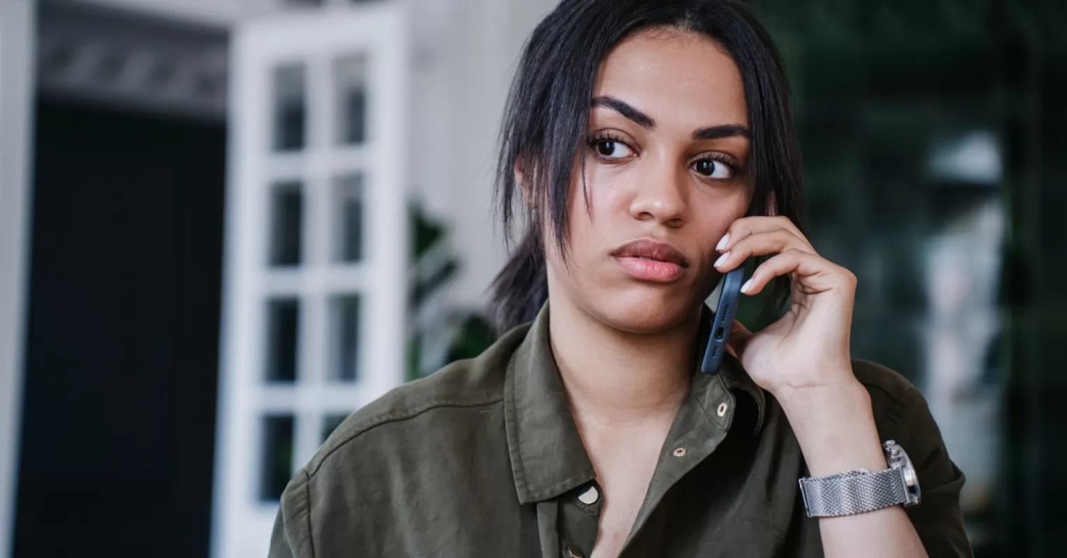 Person reflecting on uncertainty in a relationship connected to signs your partner feels misunderstood and emotionall...