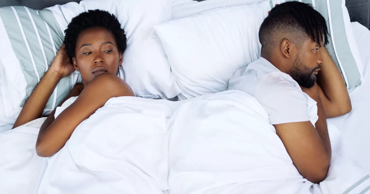 Couple discussing feelings during a moment of emotional withdrawal after expressing intimacy needs