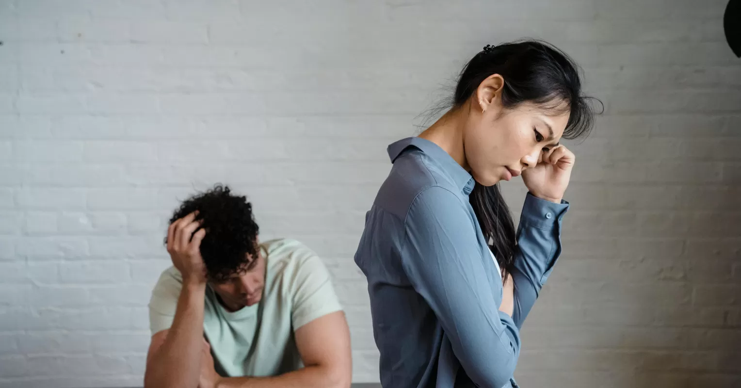 Individual contemplating feelings of uncertainty when partner doesn't respond to texts