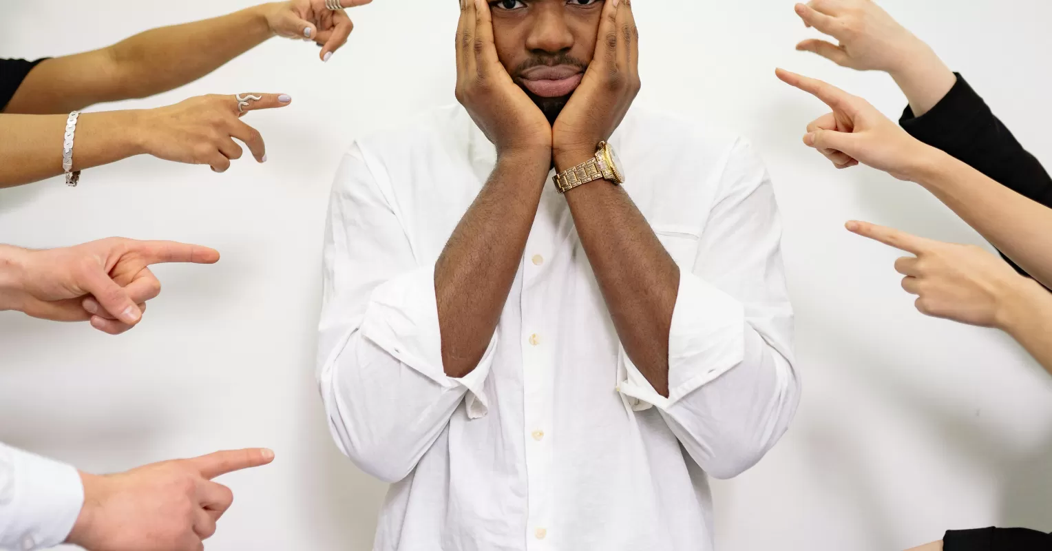 Person reflecting on emotional behavior and meaning connected to what happens when a man tries to be vulnerable
