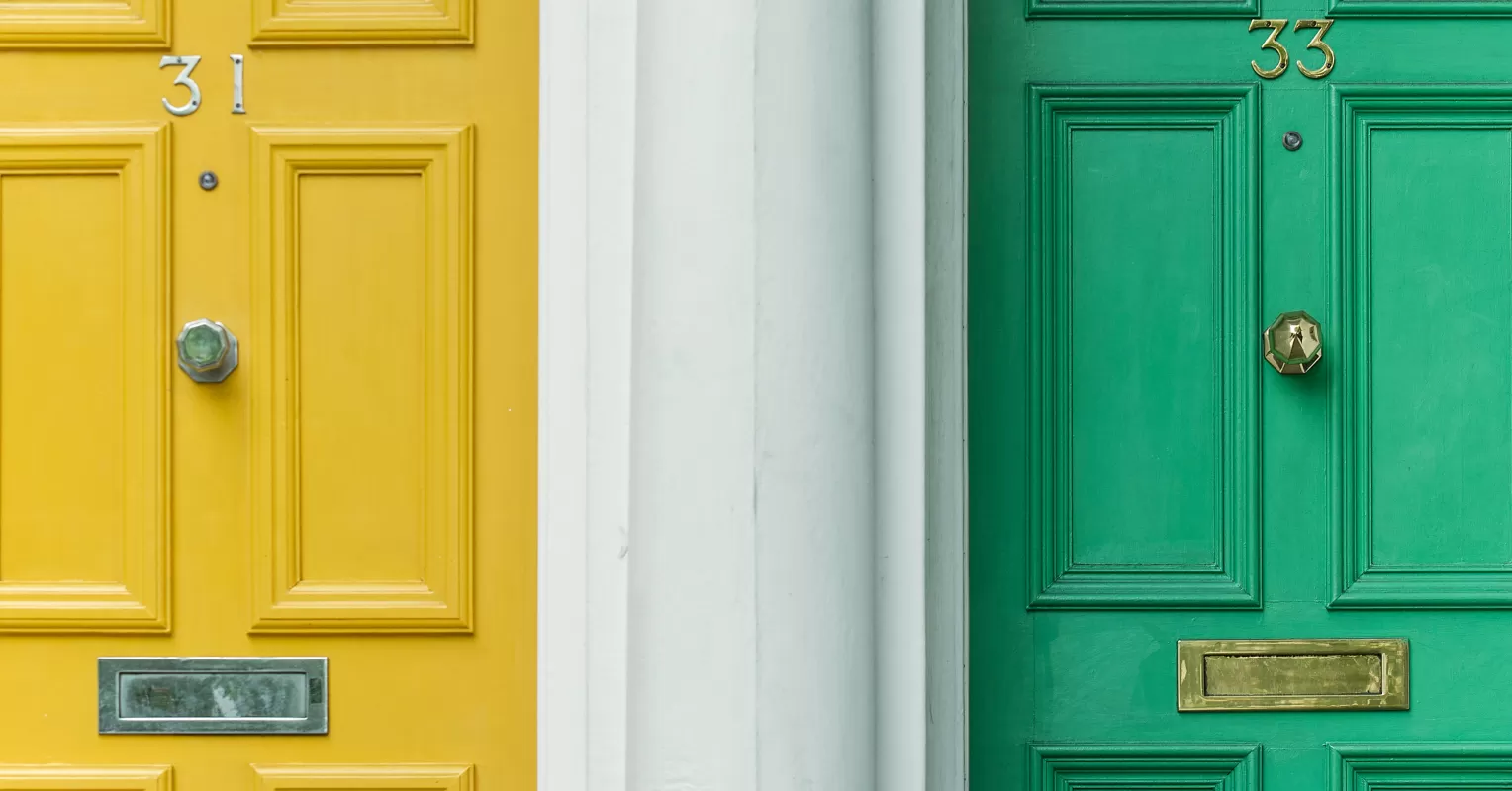 Neighbor smiling while hiding feelings of loneliness behind a cheerful facade