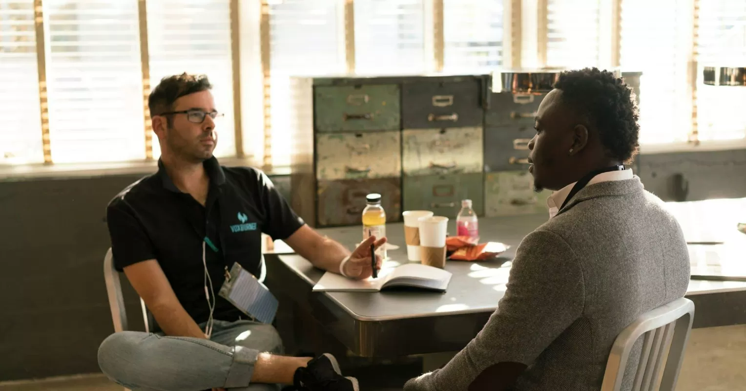 Couple sitting in silence, indicating avoidance of certain conversation topics