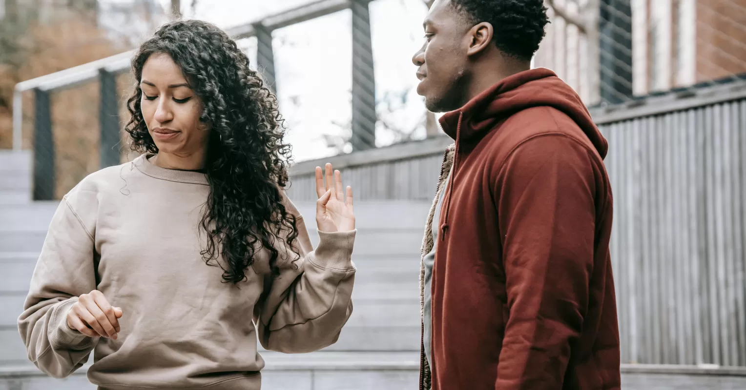 Couple engaged in a heated argument, highlighting emotional responses during conflicts