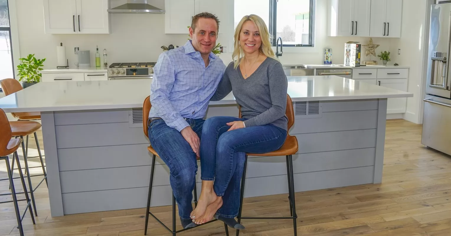 Partner displaying signs of stress at home, indicating emotional overwhelm in a relationship