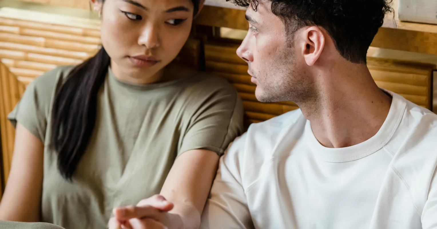 Couple discussing feelings after receiving an insincere apology during a tense moment