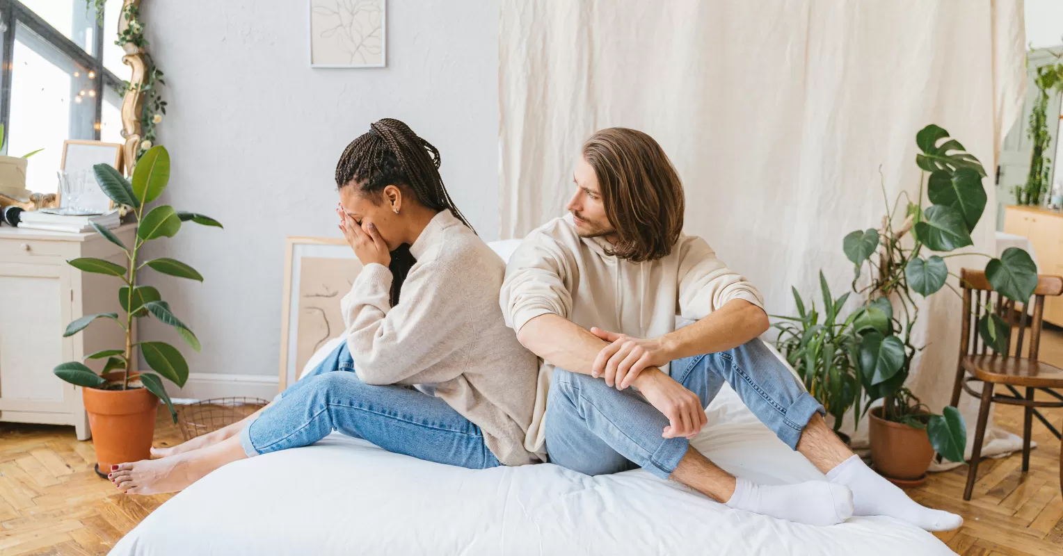 Person reflecting on uncertainty in a relationship connected to what should i do when arguments with my partner