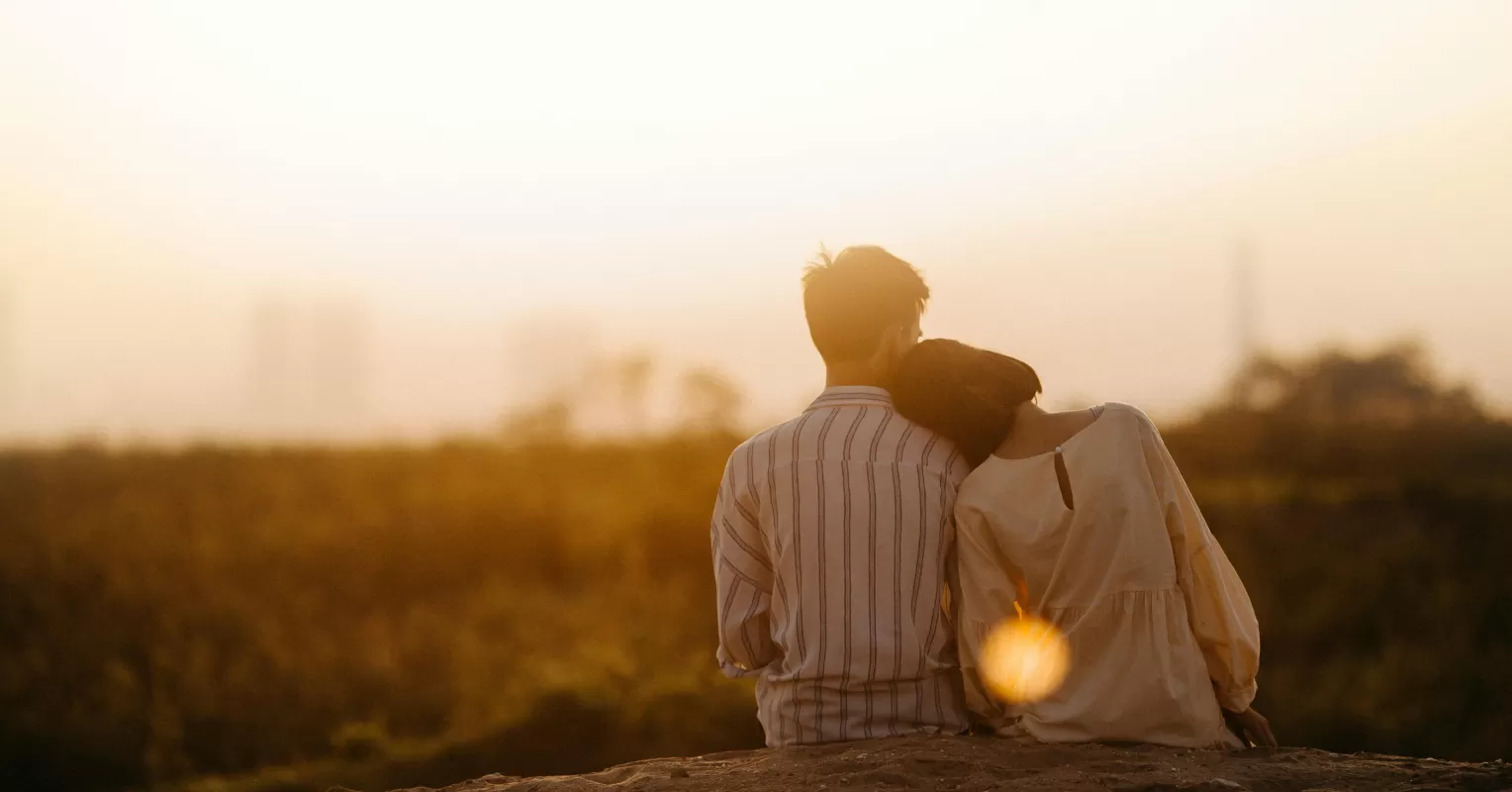 Couple discussing feelings while one partner appears distant and reserved
