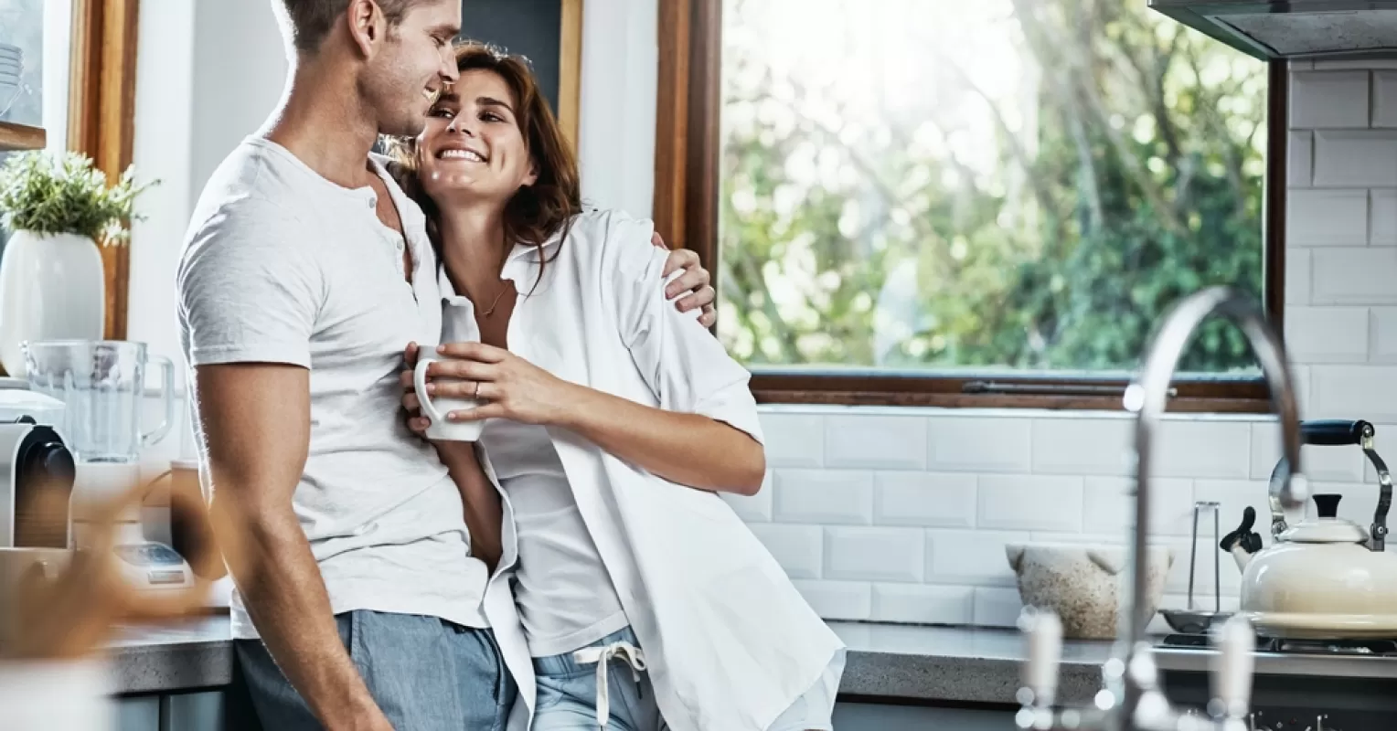 Couple experiencing emotional disconnect during an intimate conversation about relationship signals