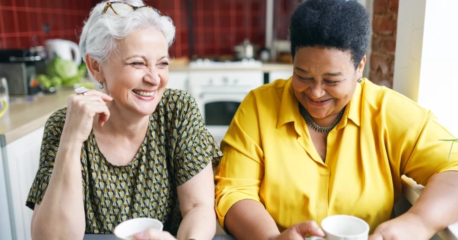 Individual feeling both exhaustion and contentment after a social gathering with friends