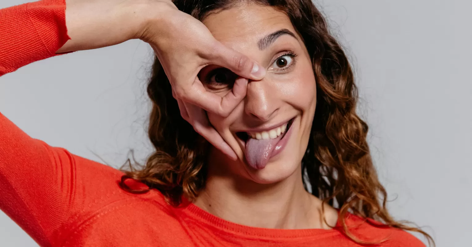 Individual feeling insecure while their partner jokes during a serious conversation