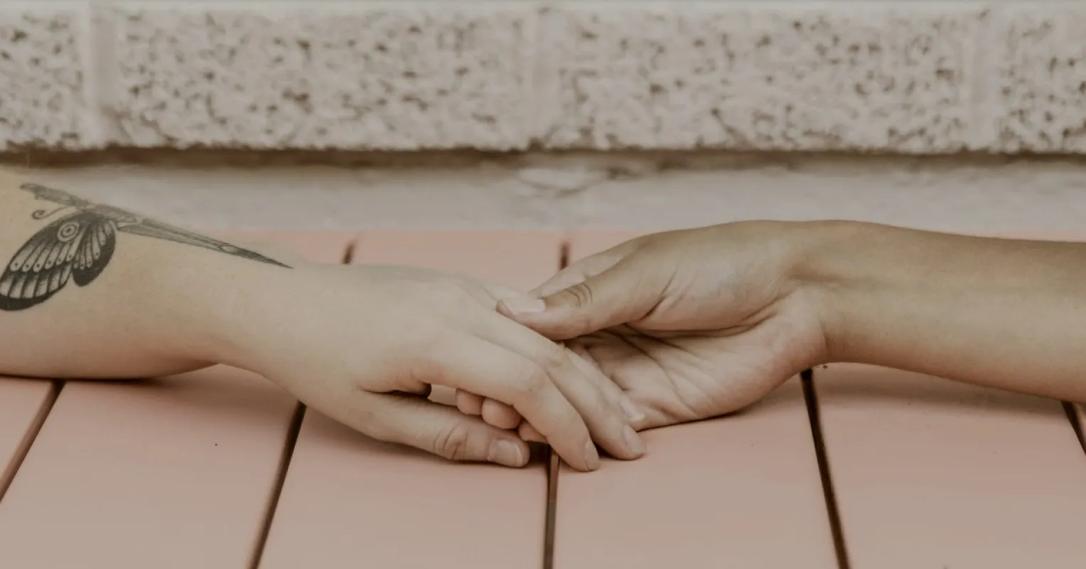 Couple discussing relationship efforts, exploring feelings of pressure to match each other's contributions