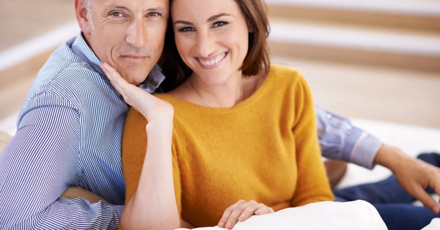 Person reflecting on uncertainty in a relationship connected to i feel the need to justify my partners age