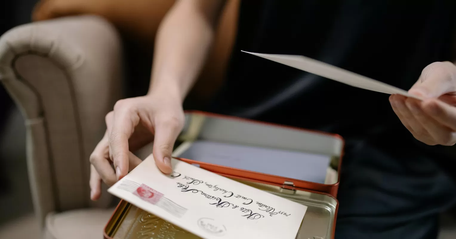 Writer feeling vulnerable while crafting a heartfelt letter to a loved one