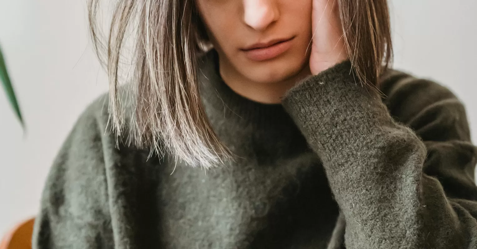 Individual feeling uncertainty while swiping through potential matches on dating apps