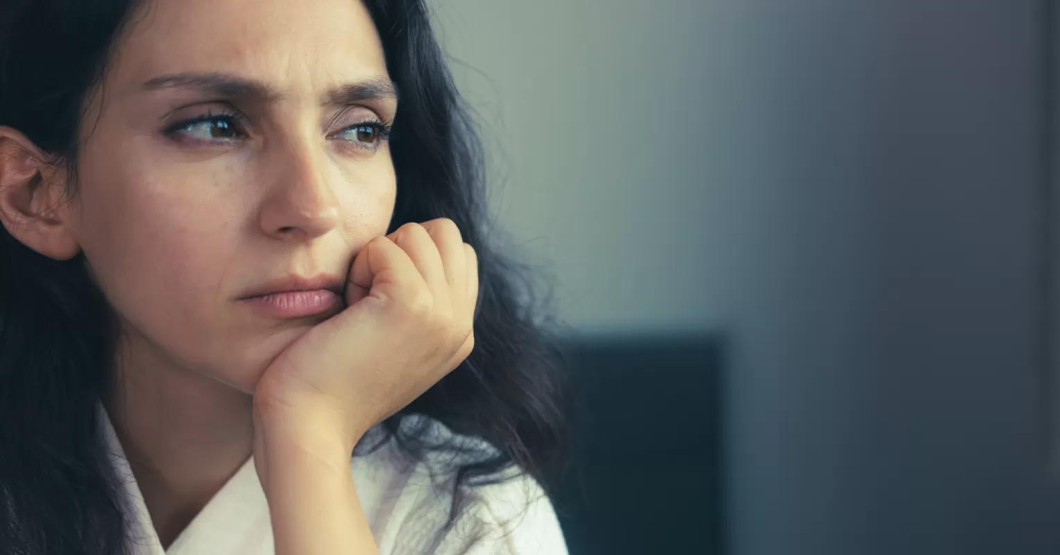 Individual contemplating personal boundaries while feeling challenged in a relationship