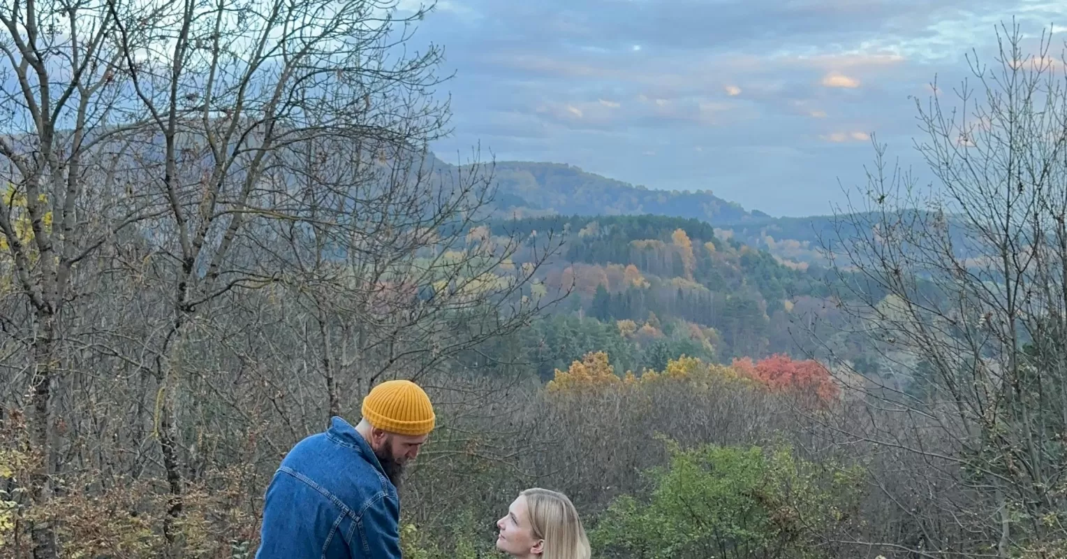 Couple experiencing tension and blame during a conflict discussion, reflecting emotional patterns.