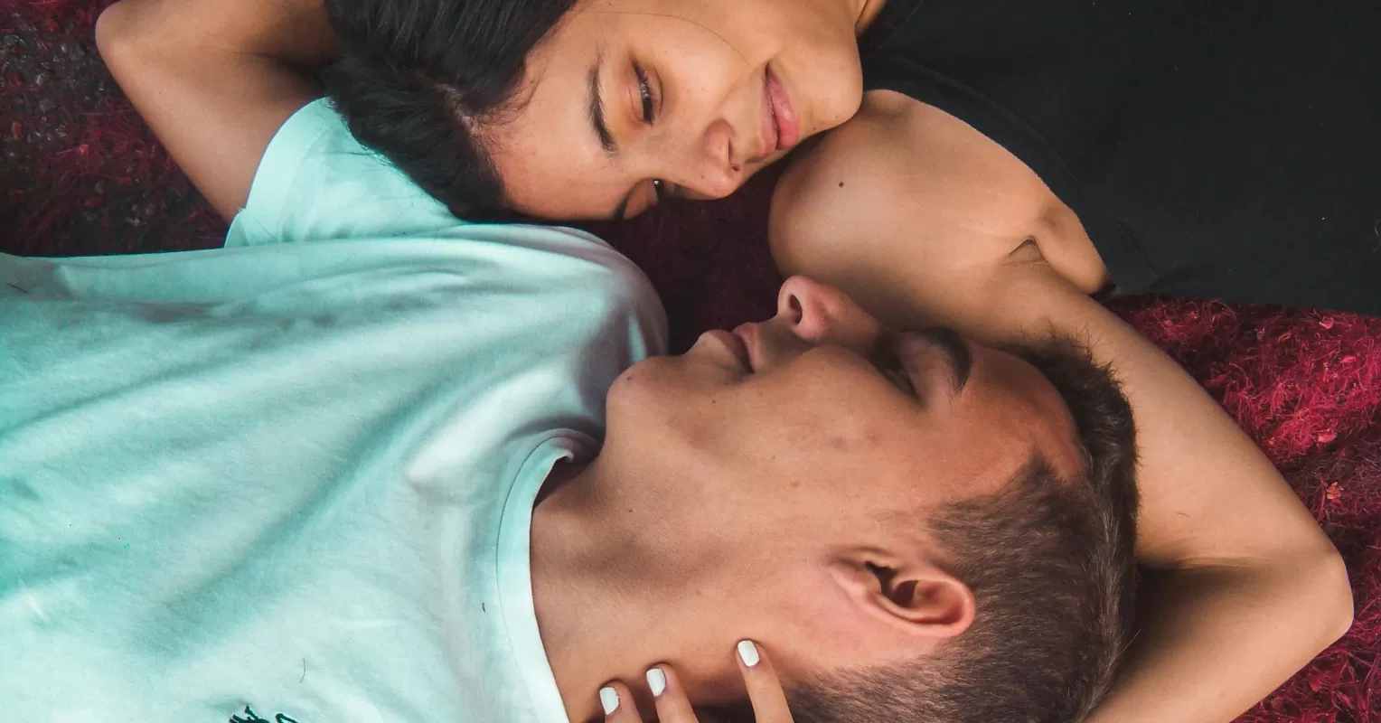 Couple experiencing emotional disconnection after a moment of intimacy in their relationship