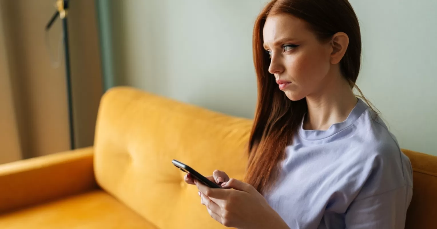 Person reflecting on uncertainty in a relationship connected to why is ghosting a relationship so emotionally damaging