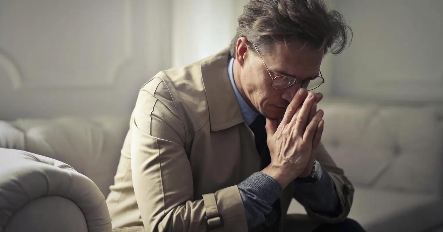 Person reflecting on uncertainty in a relationship connected to i feel disconnected when my partner judges me