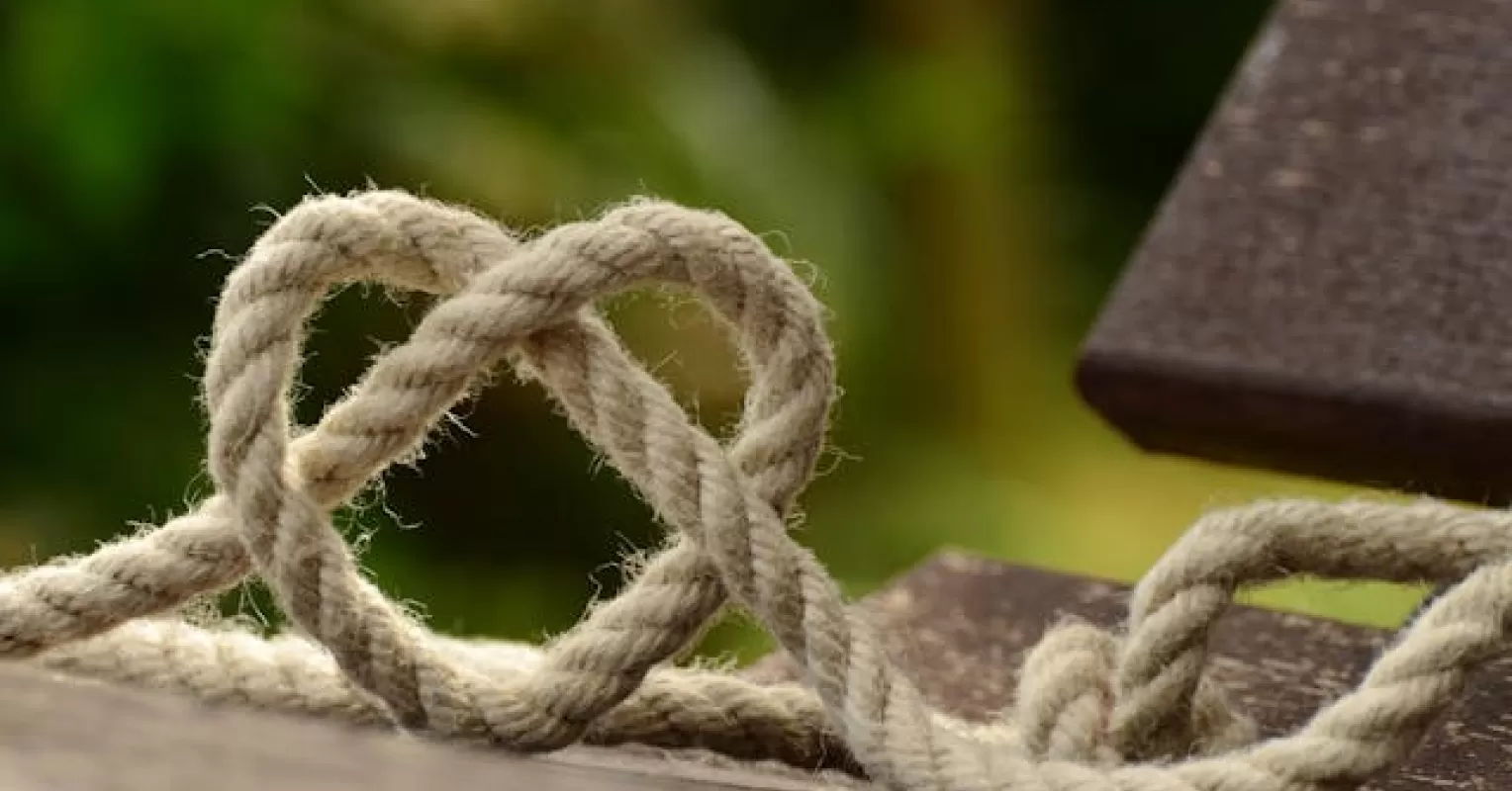Individual contemplating the need to demonstrate love amid relationship signals and emotional patterns