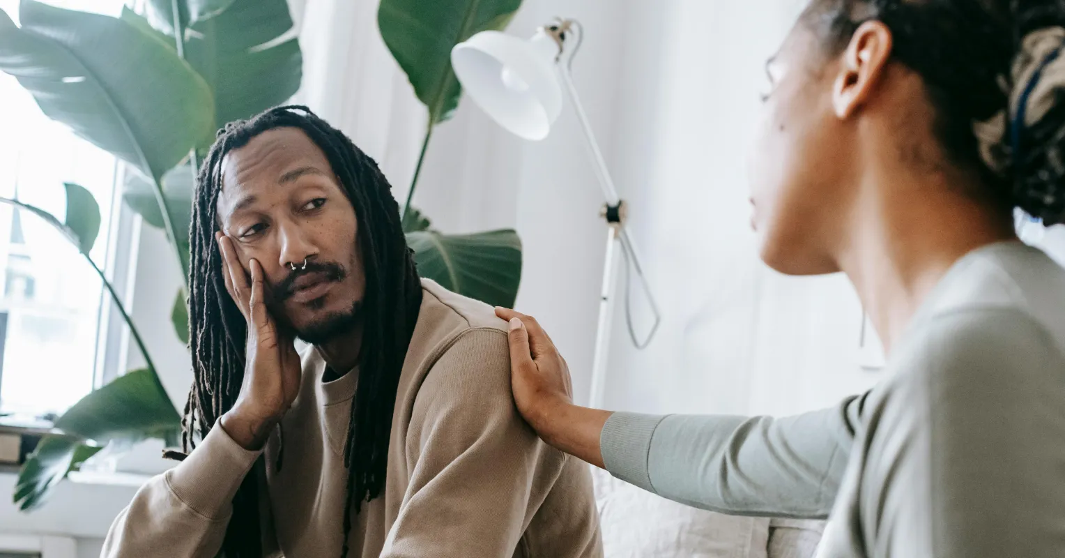 Couple communicating amid emotional tension, exploring misunderstanding during conflicts.