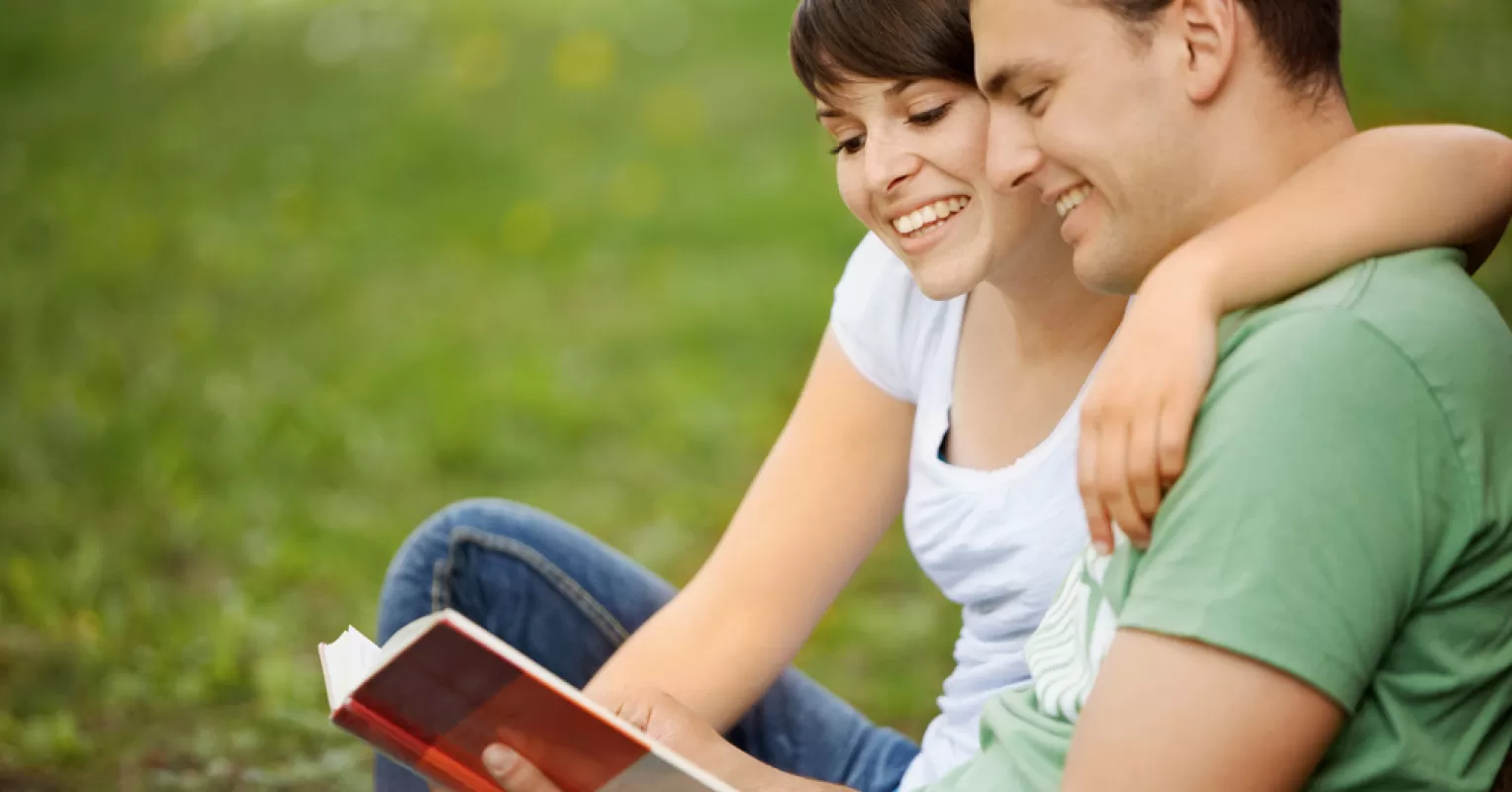 Person contemplating the attraction to intelligence over physical appearance in relationships