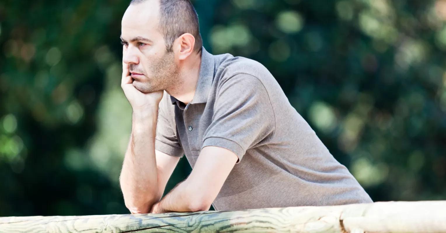 Adult seeking reassurance through a supportive friend during emotional uncertainty
