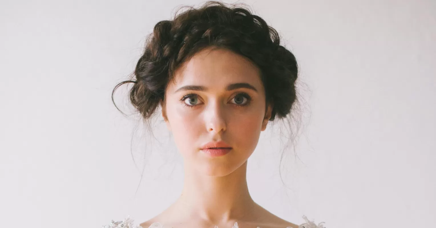 Individual contemplating their feelings related to a victim mindset in relationships