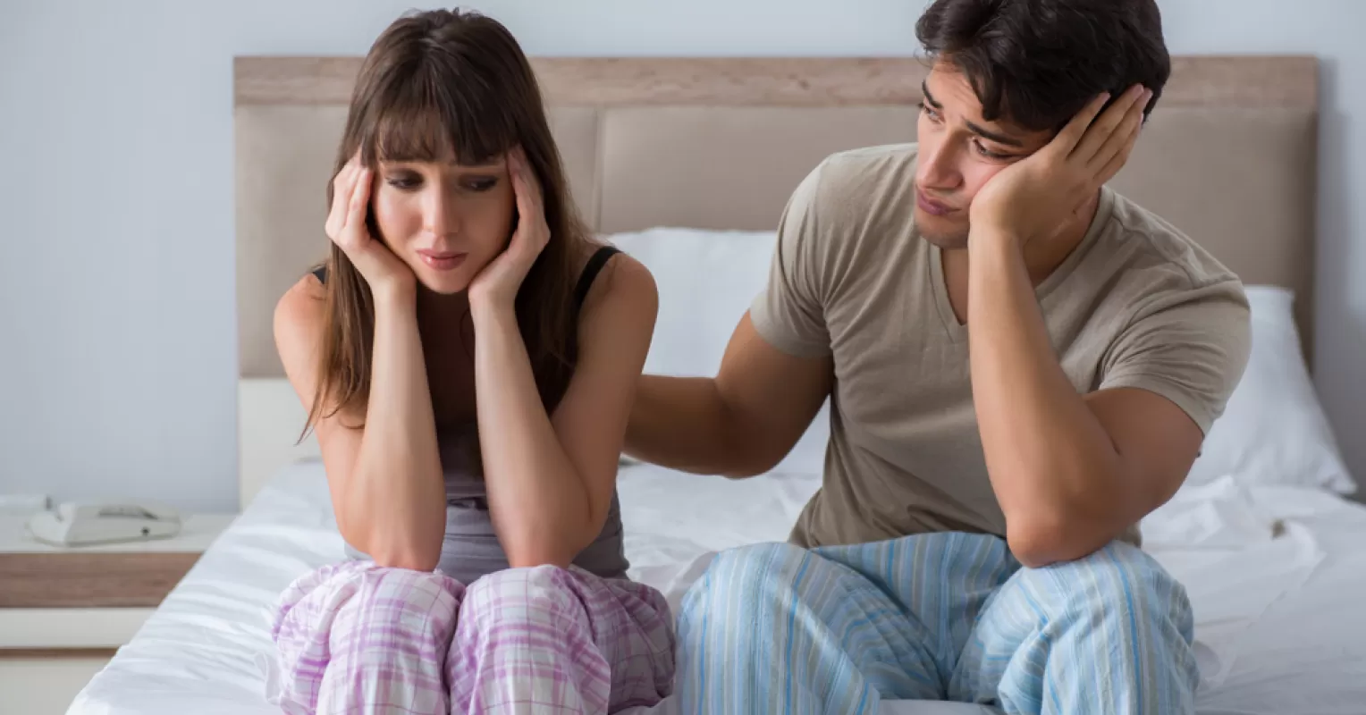 A person reflecting on intimacy issues related to upbringing and childhood roles