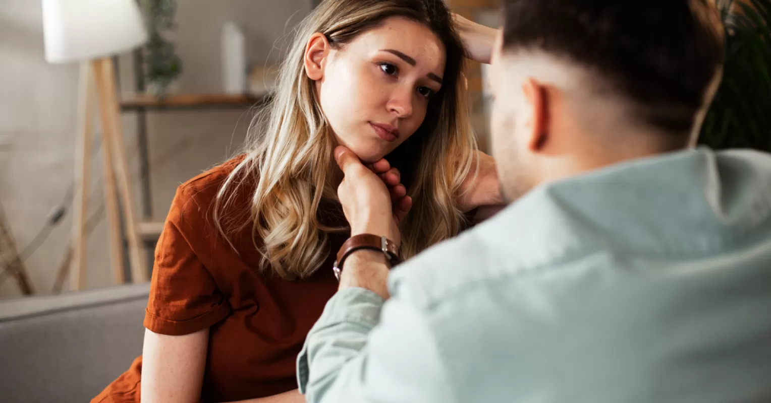 Couple engaged in deep conversation about future commitments and trust issues