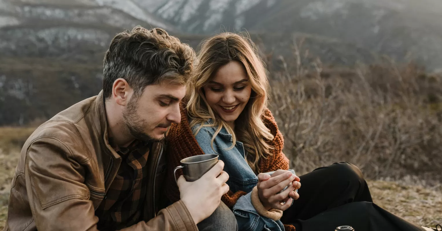 Person looking contemplative, pondering what it means when a friend acts distant post-hookup.