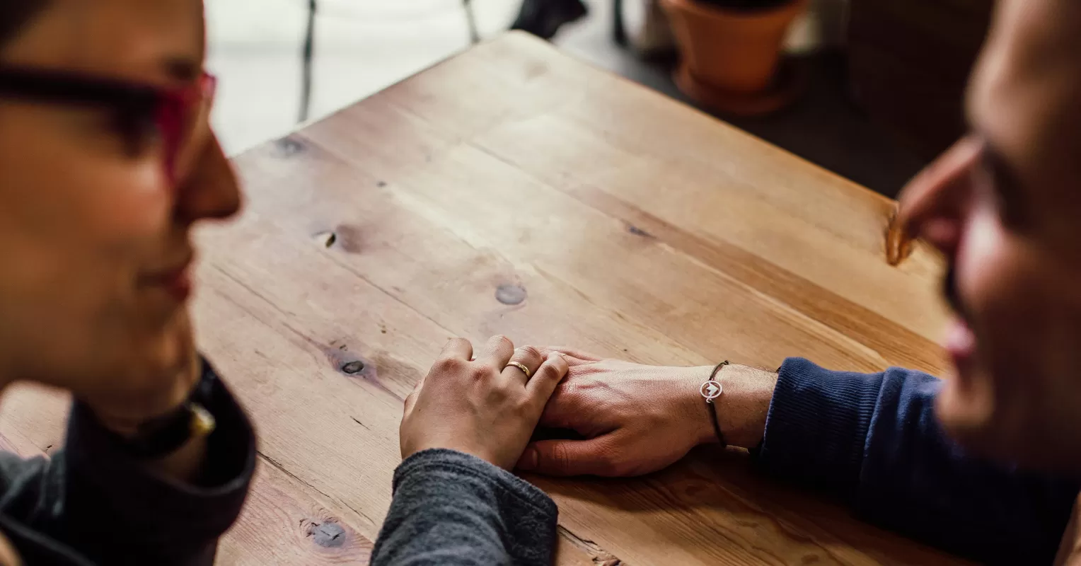 Couple discussing emotional needs and feelings of overwhelm in their relationship