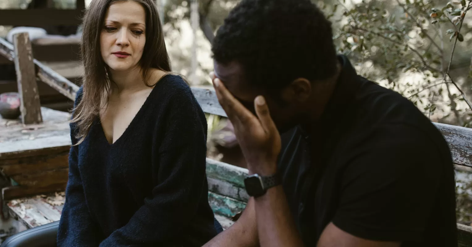 Individual finding strength and growth after a blindsided breakup, reflecting on positive changes.
