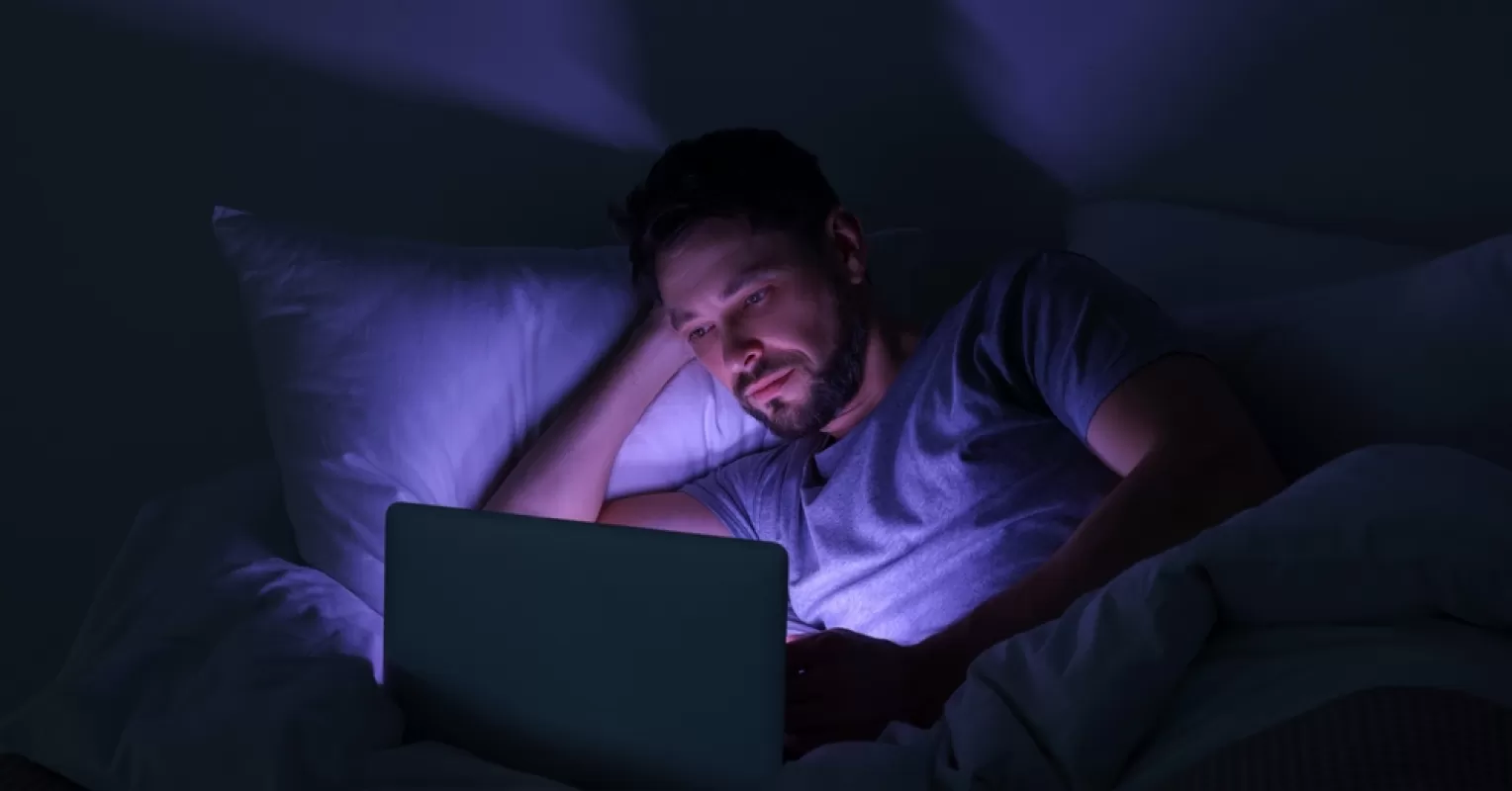 Individual contemplating body image issues stemming from porn consumption's social dynamics